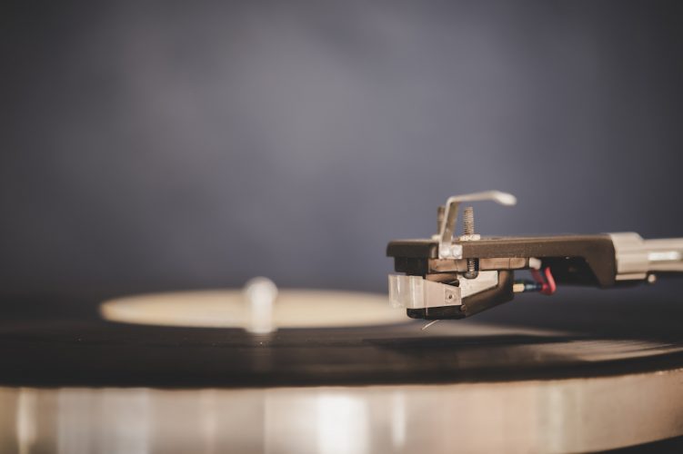 Spinning Record Player With Vintage Vinyl, Turntable Player And Vinyl Record.